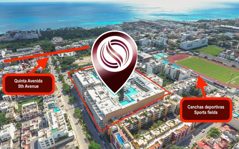 Condo Reduced price with ocean view from infinity pool, 400 meters from the beach and steps from Fifth Avenue. Amenities for the family.