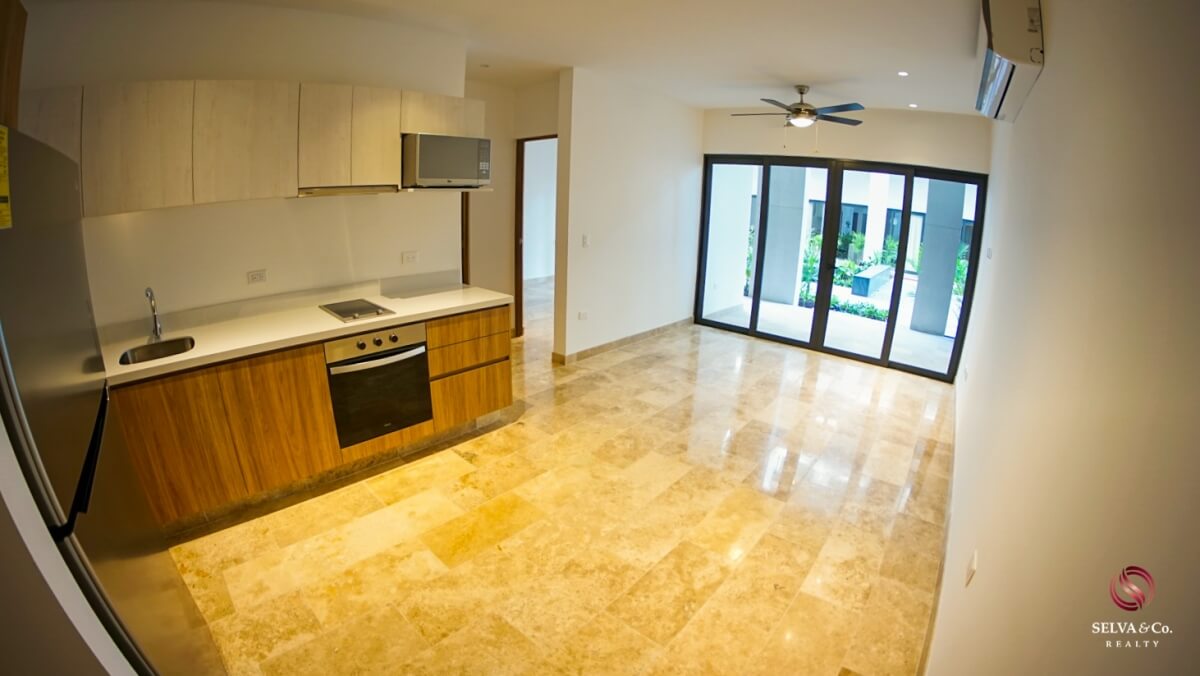 Apartment 240 meters from the beach, steps from Fifth Avenue, hotel amenities, pre-construction, sale Playa del Carmen.