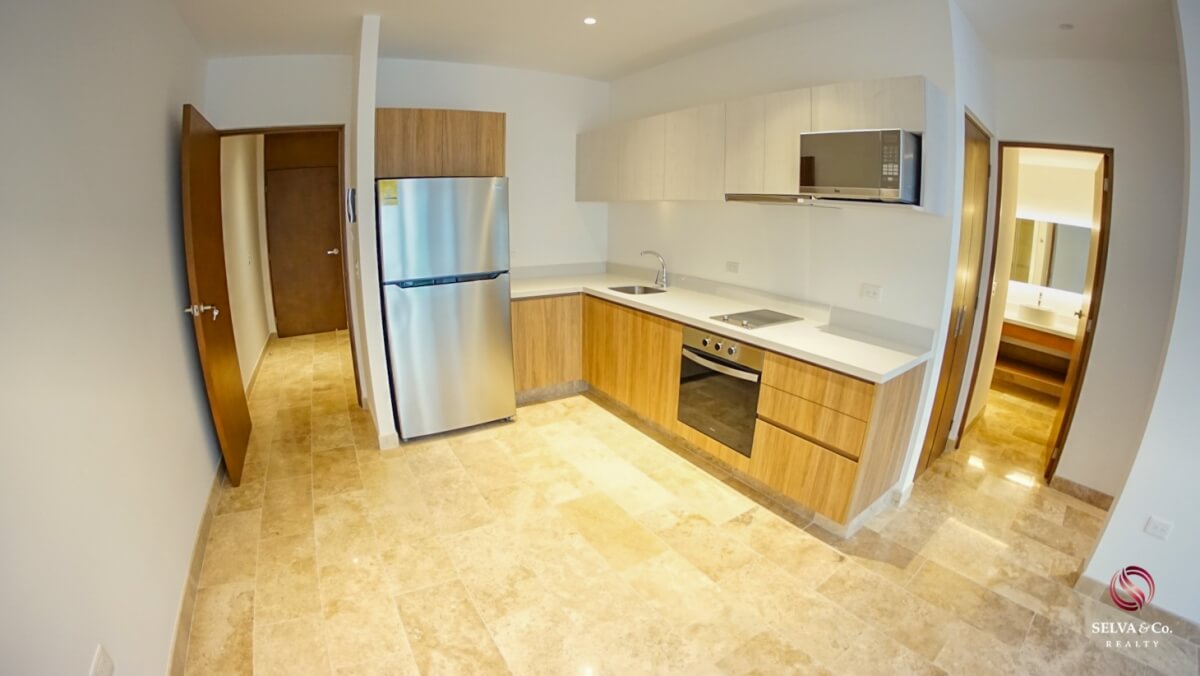 Apartment 240 meters from the beach, steps from Fifth Avenue, hotel amenities, pre-construction, sale Playa del Carmen.