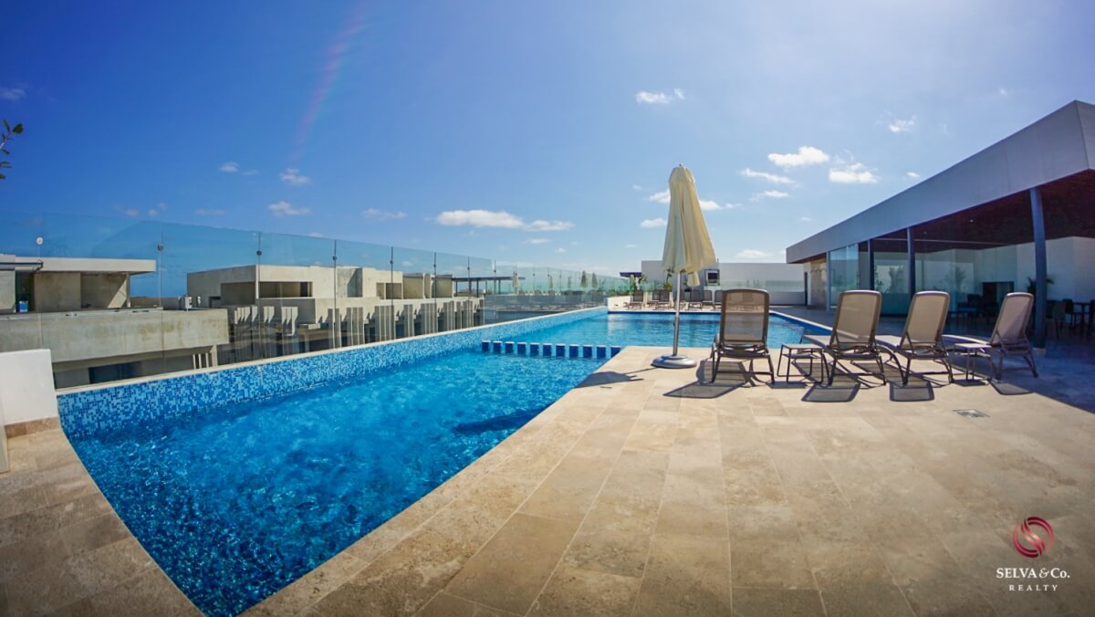 Apartment 240 meters from the beach, steps from Fifth Avenue, hotel amenities, pre-construction, sale Playa del Carmen.