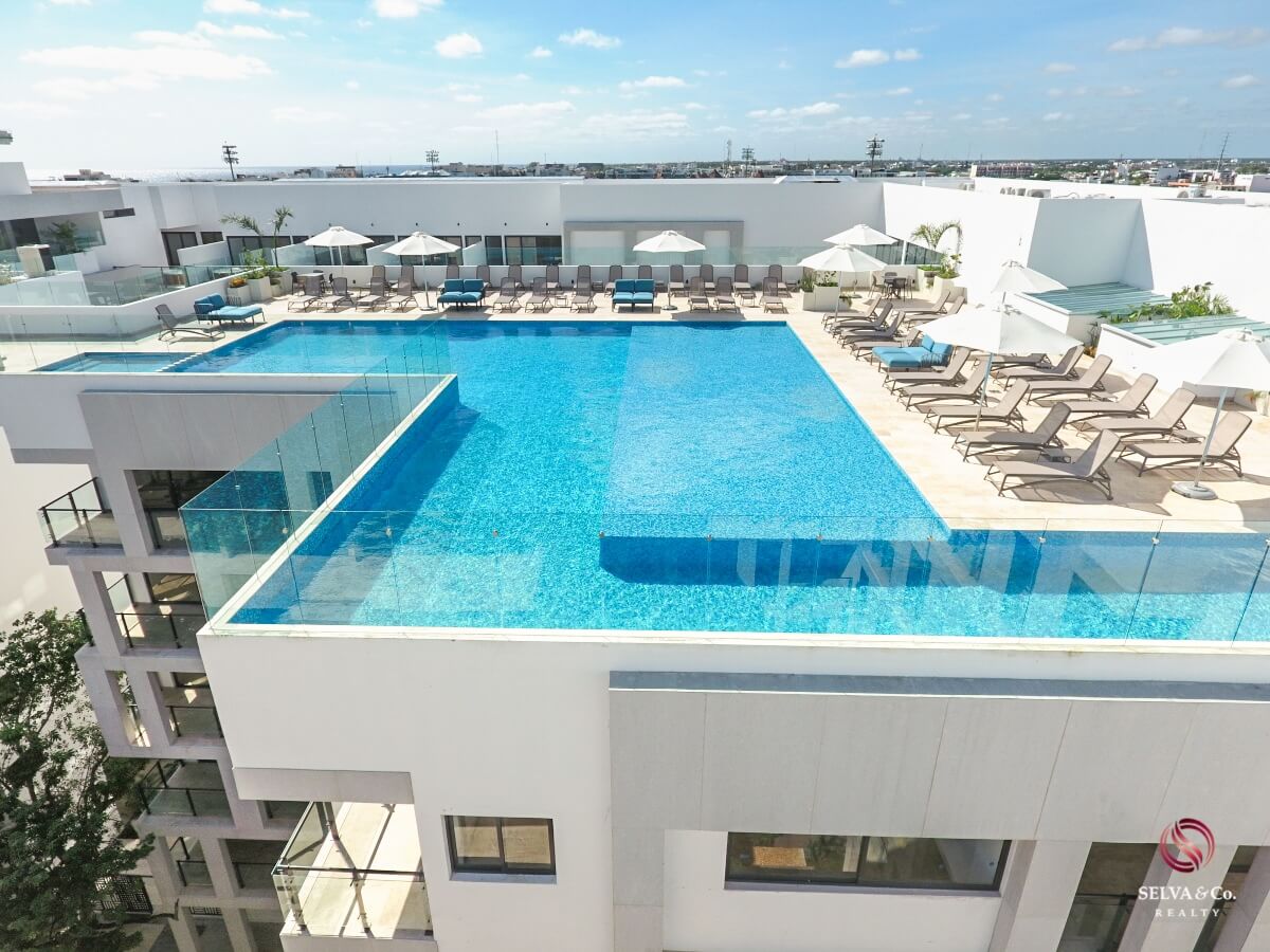 Apartment 240 meters from the beach, steps from Fifth Avenue, hotel amenities, pre-construction, sale Playa del Carmen.