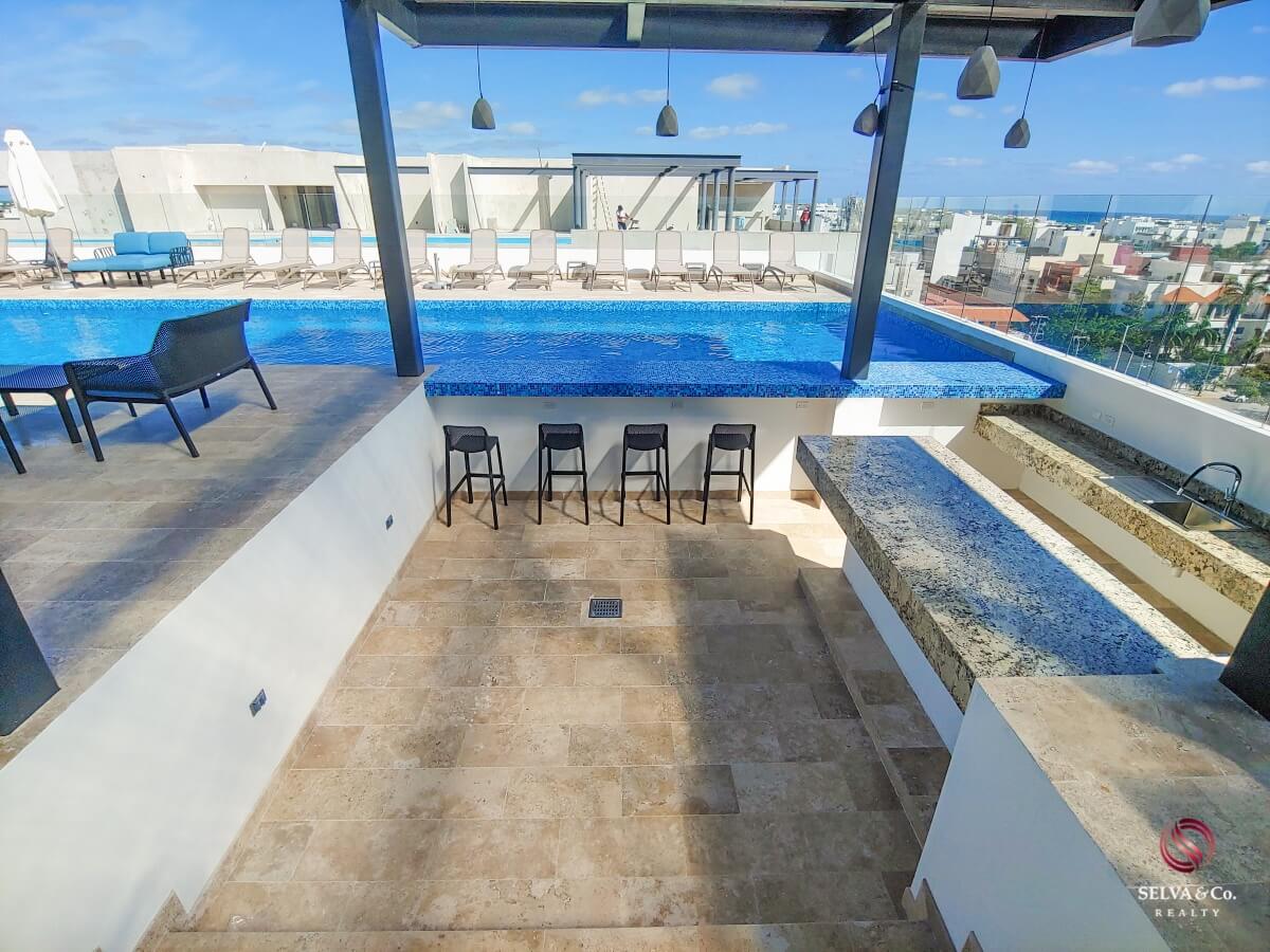 Apartment 240 meters from the beach, steps from Fifth Avenue, hotel amenities, pre-construction, sale Playa del Carmen.