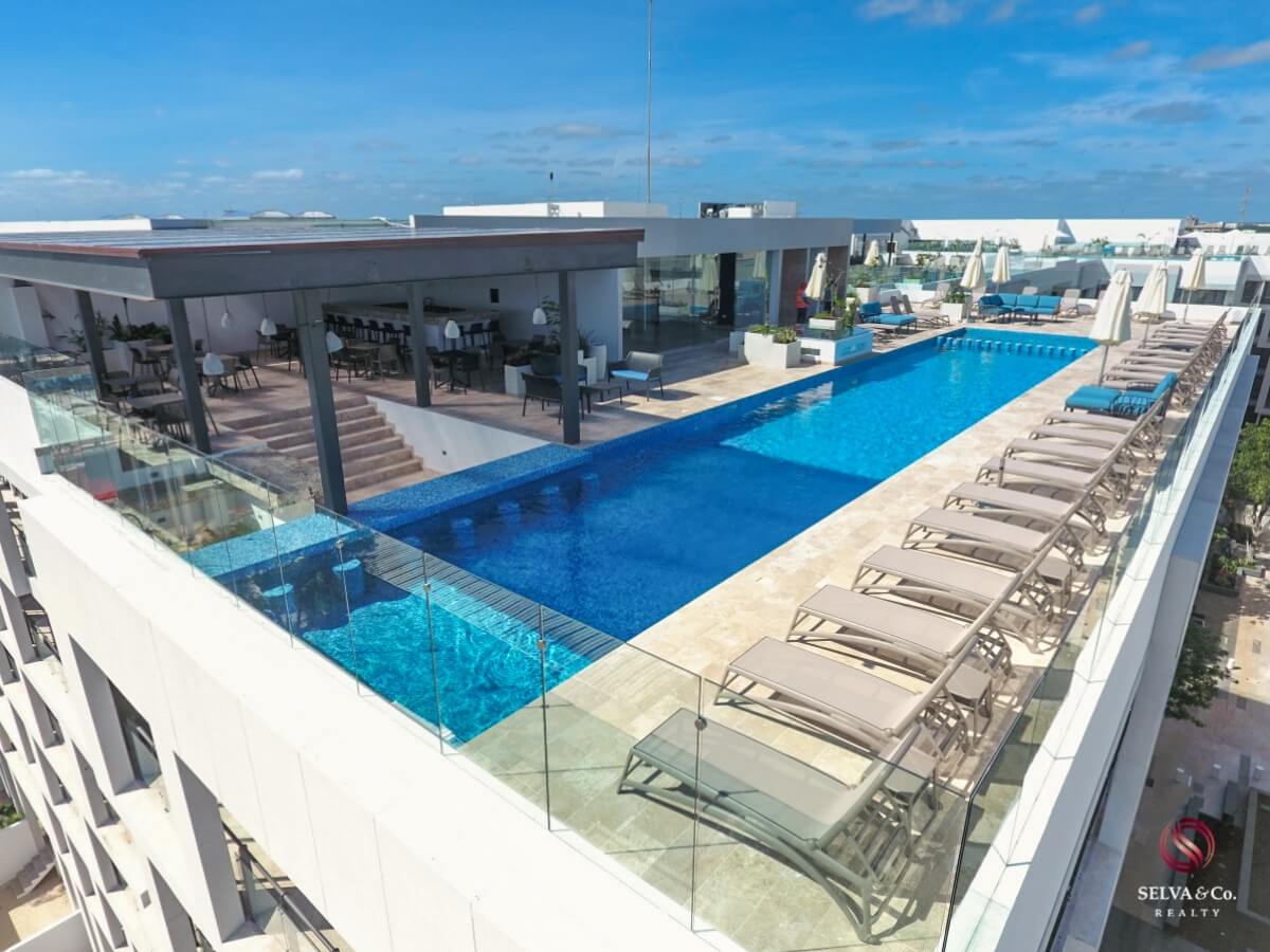 Apartment 240 meters from the beach, steps from Fifth Avenue, hotel amenities, pre-construction, sale Playa del Carmen.