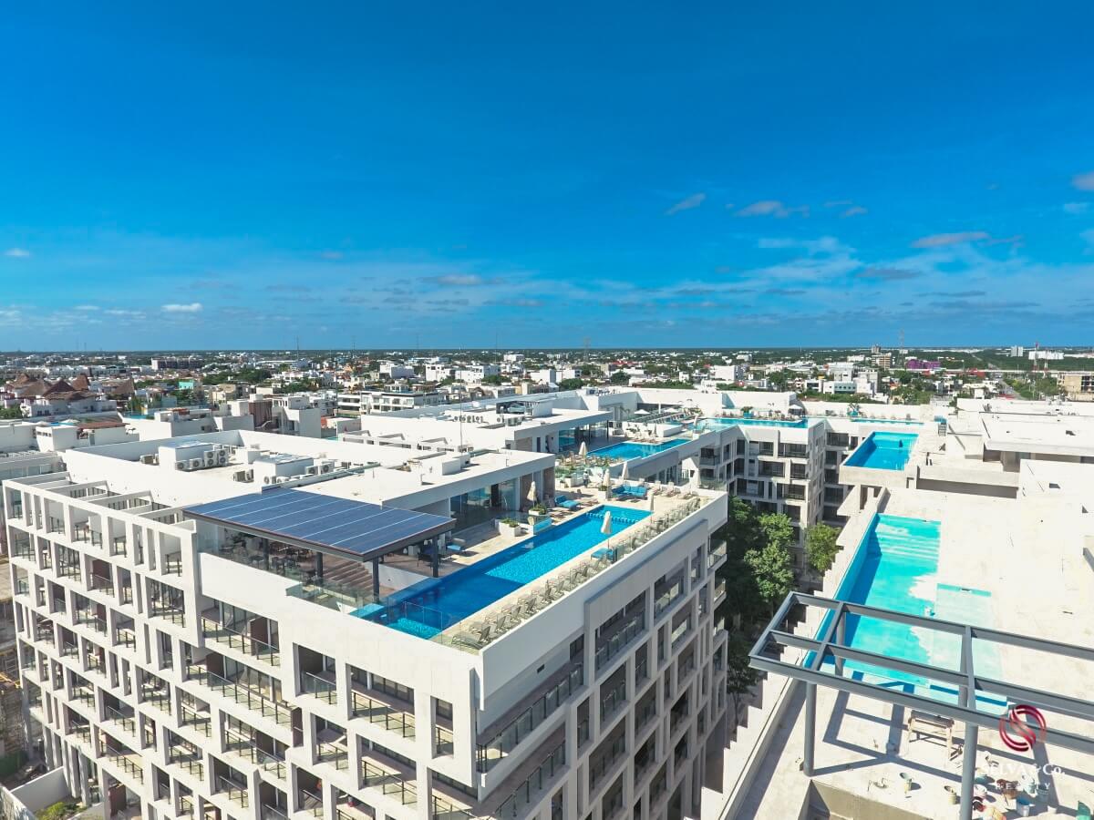 Apartment 240 meters from the beach, steps from Fifth Avenue, hotel amenities, pre-construction, sale Playa del Carmen.