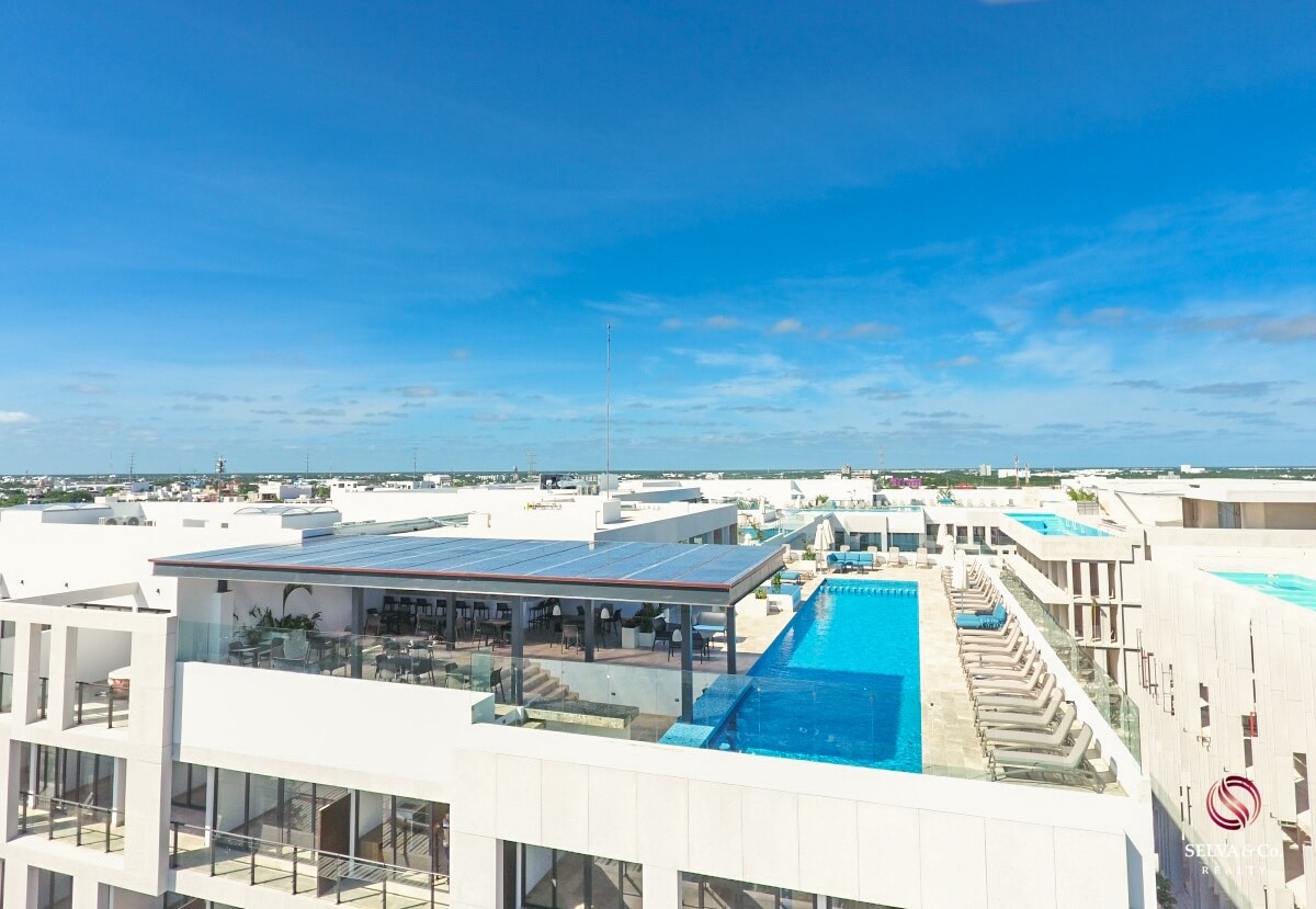 Apartment 240 meters from the beach, steps from Fifth Avenue, hotel amenities, pre-construction, sale Playa del Carmen.