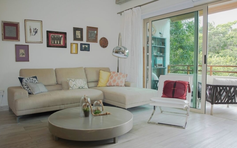 Condo with beautiful furniture and unique decoration, 10 minutes from the beach,  in Aldea Zama Tulum. For sale.