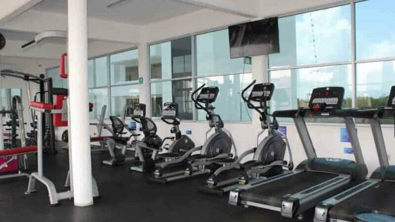 Luxury house with private pool, Green views, clubhouse with sports fields, in gated community Aqua, Cancun, for sale.