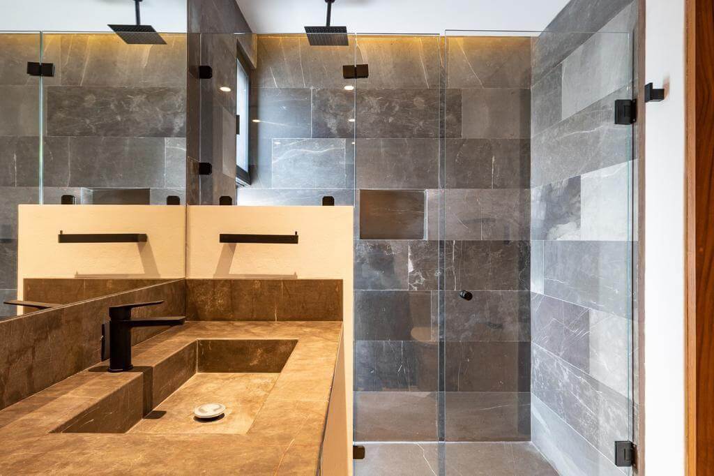 Luxury house with private pool, Green views, clubhouse with sports fields, in gated community Aqua, Cancun, for sale.