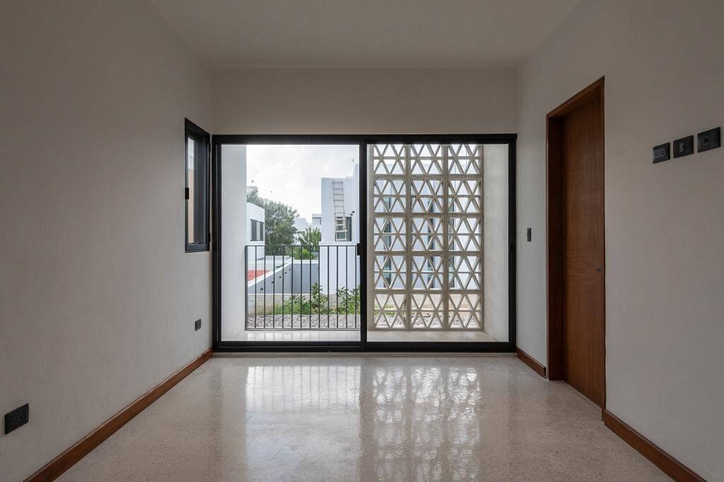 Luxury house with private pool, Green views, clubhouse with sports fields, in gated community Aqua, Cancun, for sale.