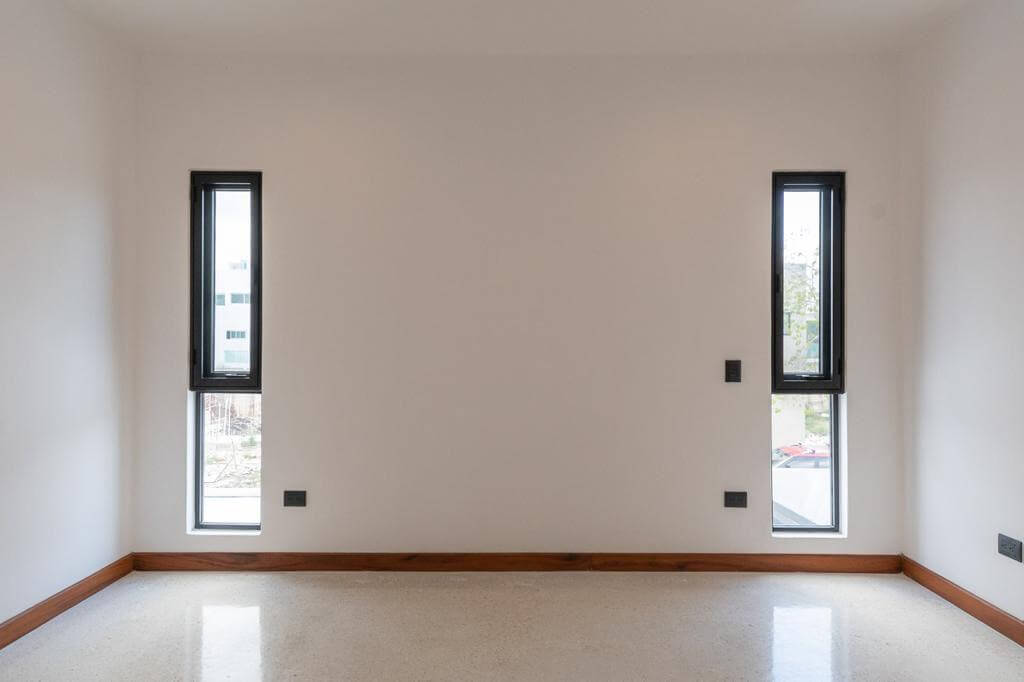 Luxury house with private pool, Green views, clubhouse with sports fields, in gated community Aqua, Cancun, for sale.