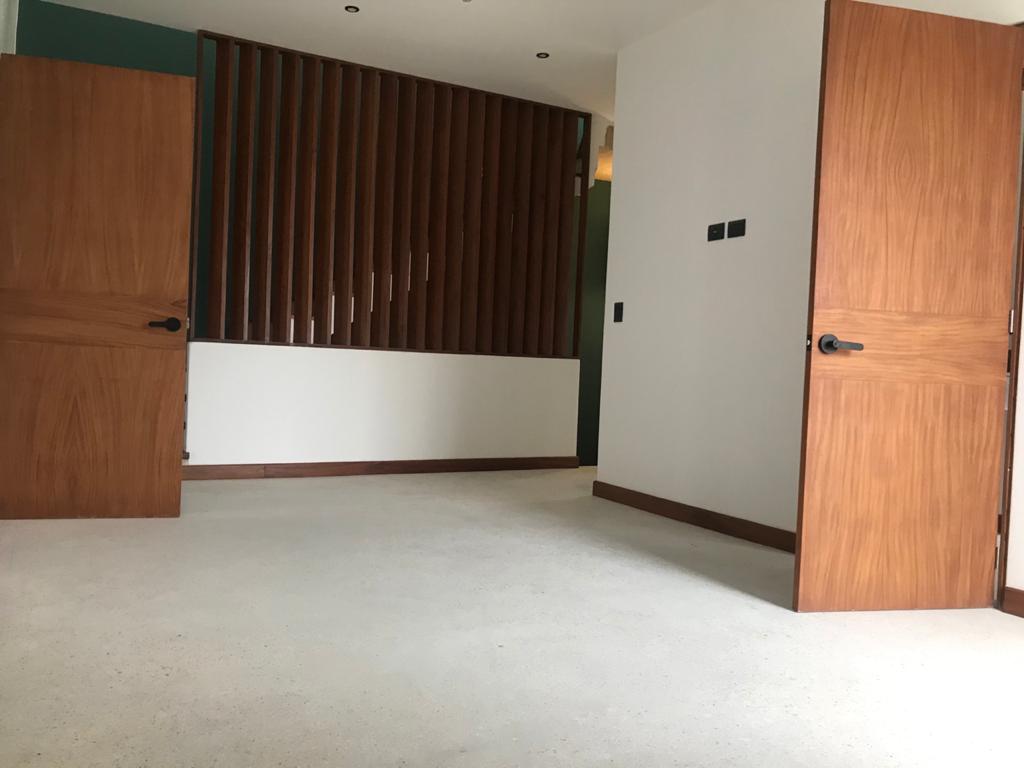 Luxury house with private pool, Green views, clubhouse with sports fields, in gated community Aqua, Cancun, for sale.