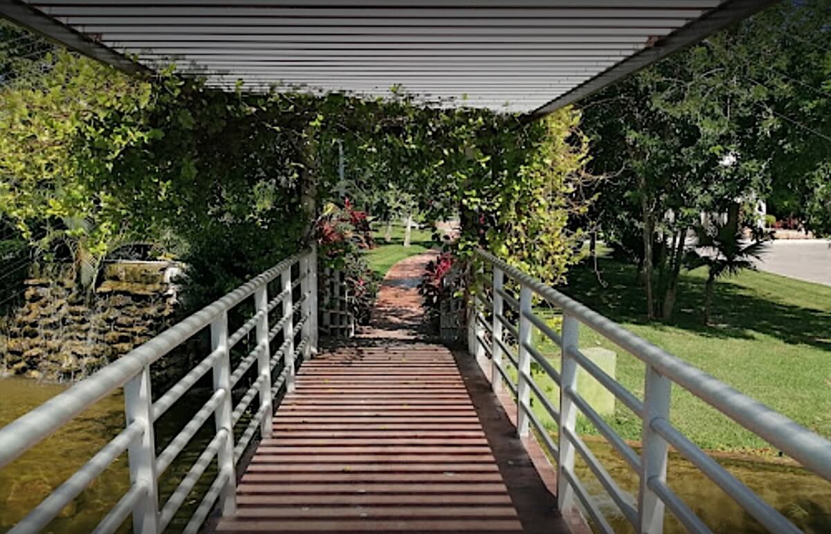 Luxury house with private pool, Green views, clubhouse with sports fields, in gated community Aqua, Cancun, for sale.