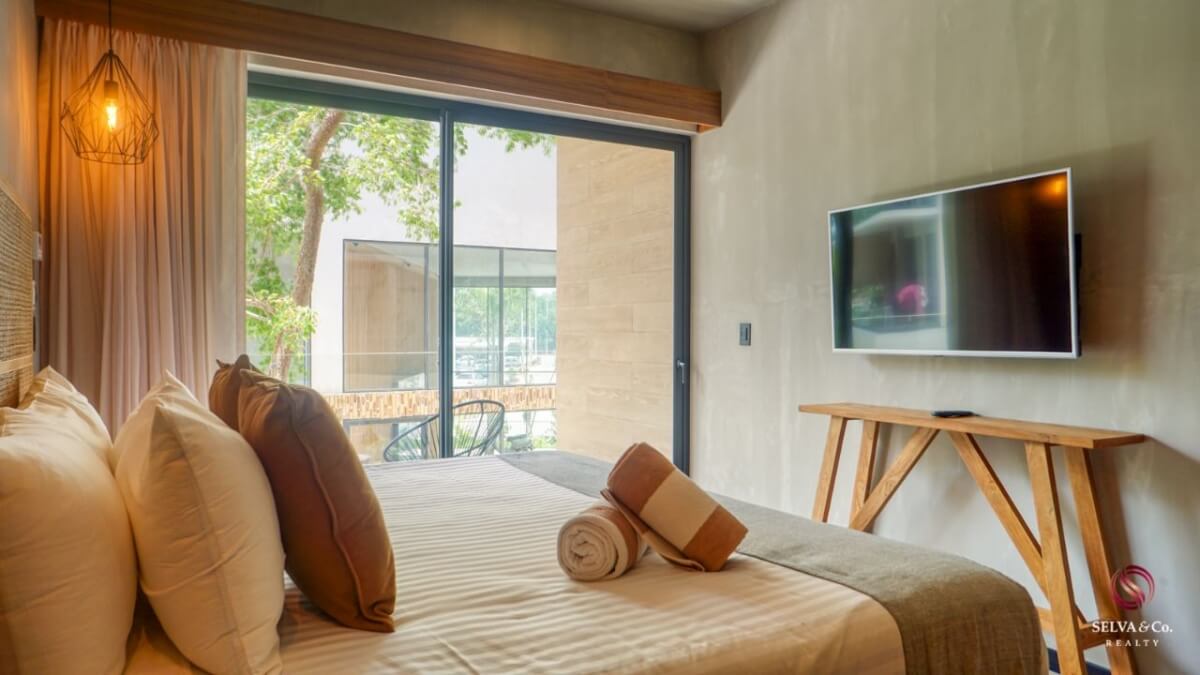 Condo with iconic pool, gym, concierge, terrace, restaurant, furnished, immediate delivery for sale The Panoramic, Tulum.