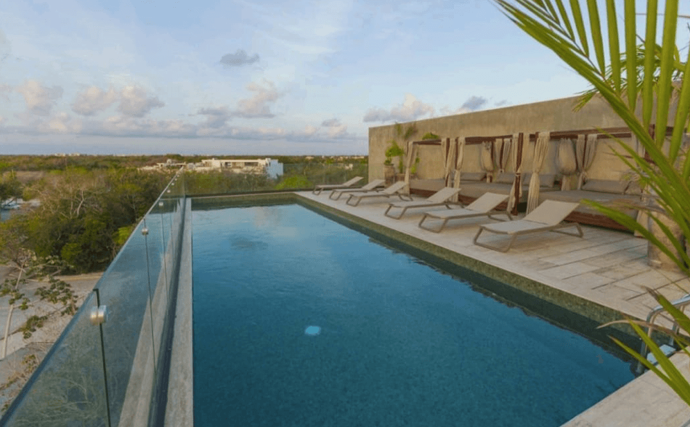 Condo with iconic pool, gym, concierge, terrace, restaurant, furnished, immediate delivery for sale The Panoramic, Tulum.