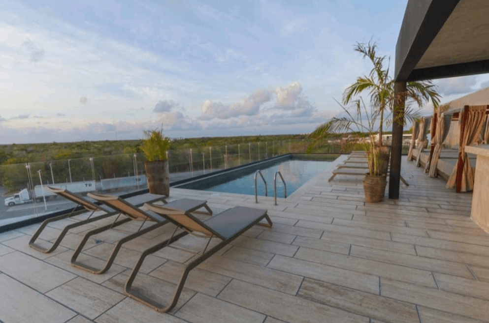 Condo with iconic pool, gym, concierge, terrace, restaurant, furnished, immediate delivery for sale The Panoramic, Tulum.
