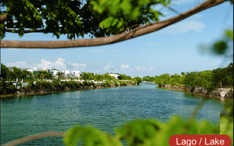 Residential land 1,003 m2 in front of a park, in gated community with exclusive amenities and clubhouse, for sale in Lagos del Sol, Cancun.