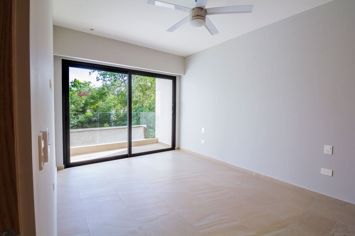 Ground floor condo with small garden, terrace with pool, jacuzzi, gym, coworking, concierge, pre-construction, for sale, Playa del Carmen.