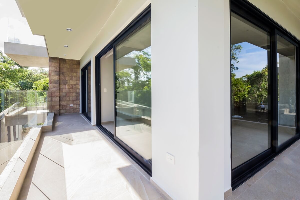 Ground floor condo with small garden, terrace with pool, jacuzzi, gym, coworking, concierge, pre-construction, for sale, Playa del Carmen.