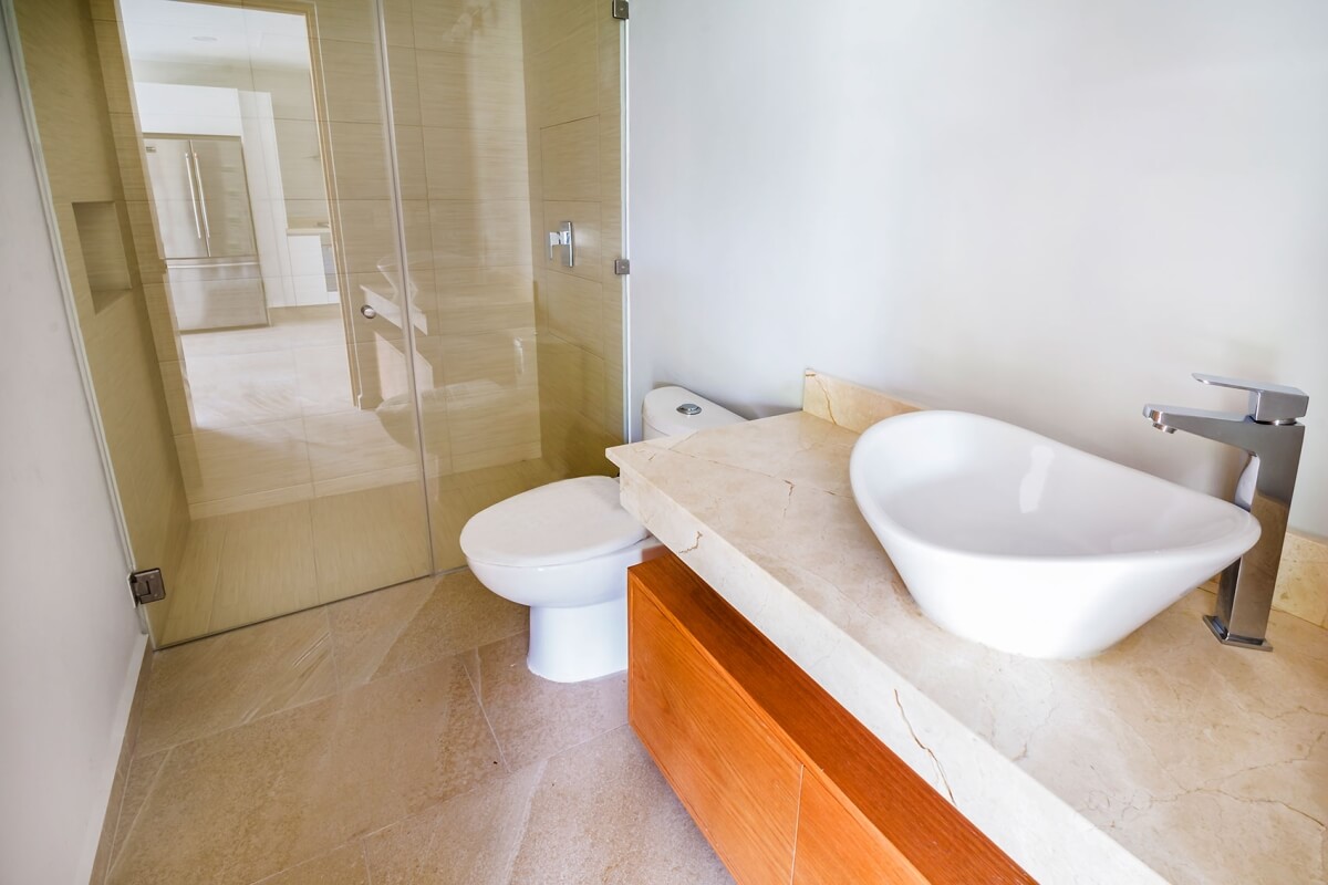 Ground floor condo with small garden, terrace with pool, jacuzzi, gym, coworking, concierge, pre-construction, for sale, Playa del Carmen.