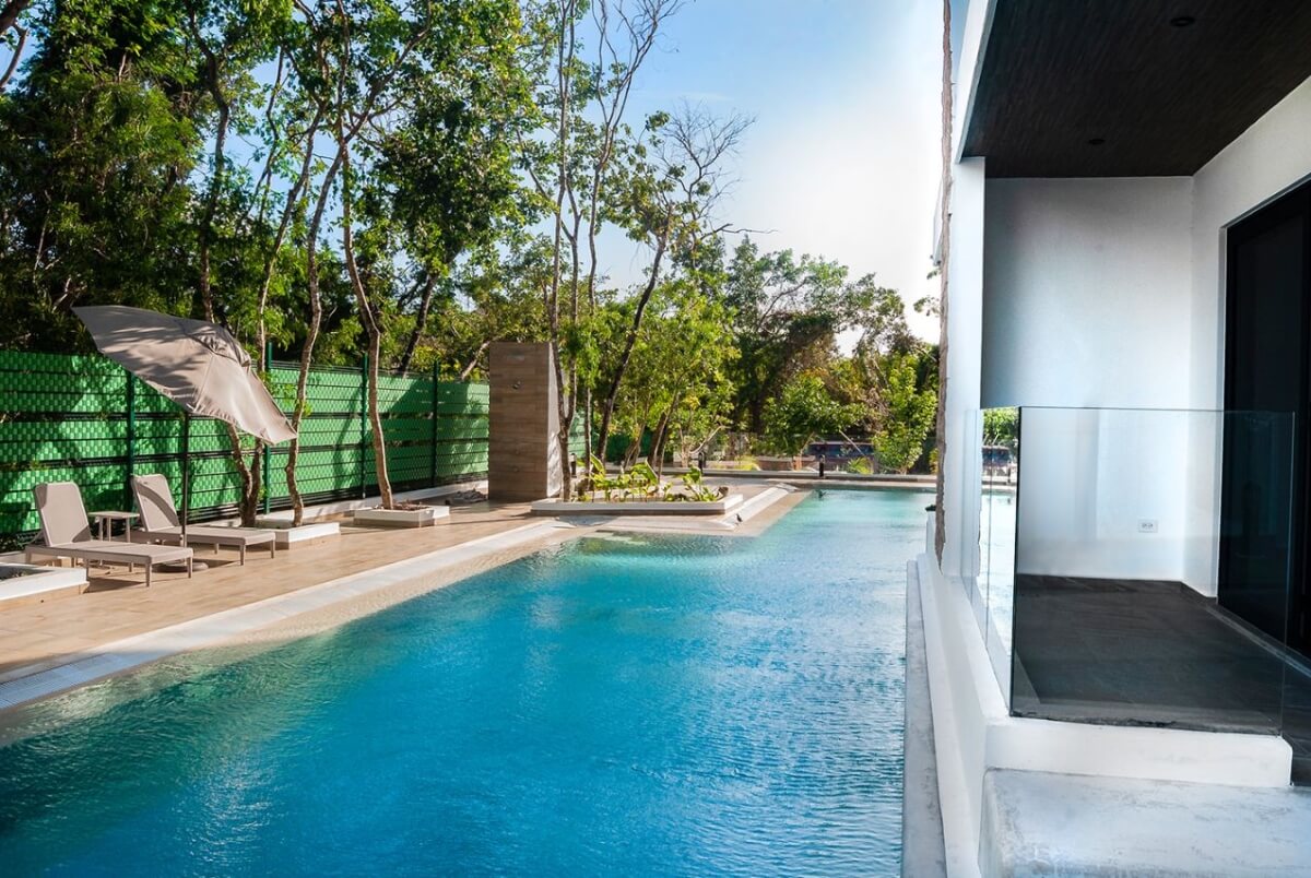 Ground floor condo with small garden, terrace with pool, jacuzzi, gym, coworking, concierge, pre-construction, for sale, Playa del Carmen.