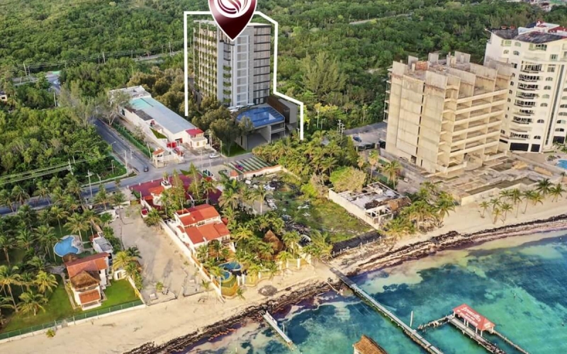 Apartment with smart home system, 50 meters from the sea, in Costa Mujeres, for sale.