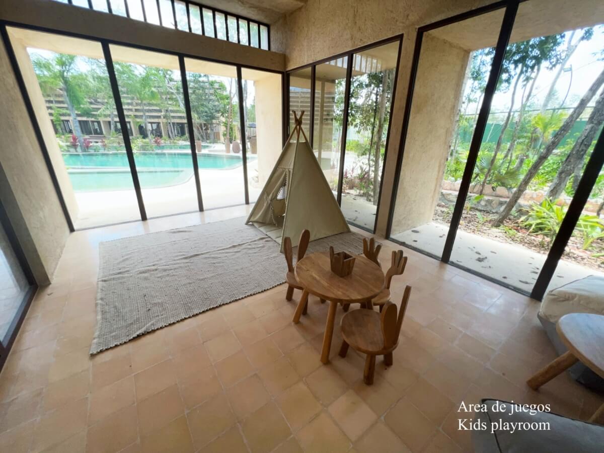 Luxury villa with pool, jacuzzi, and terrace for sale in Tulum.
