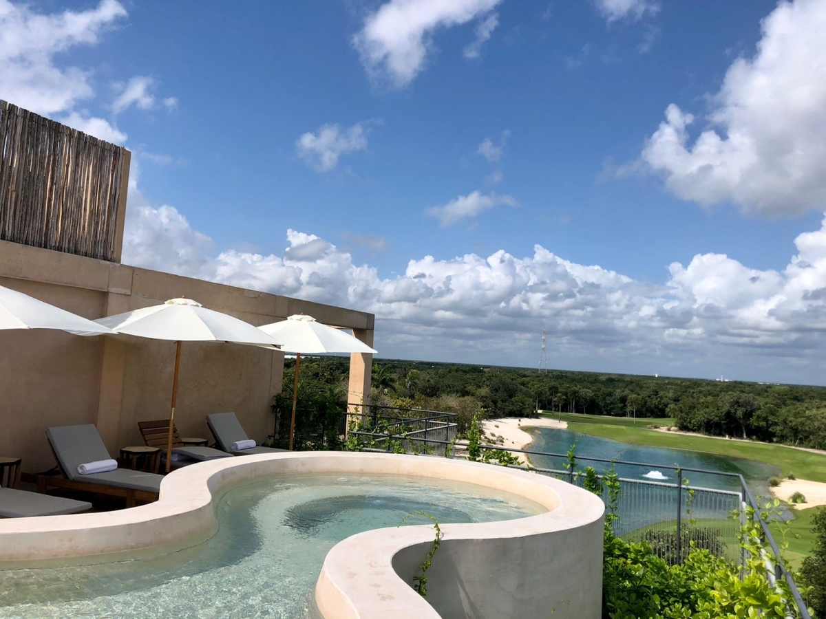 Condominium steps from the beach, ocean view pool, Playa del Carmen for sale.