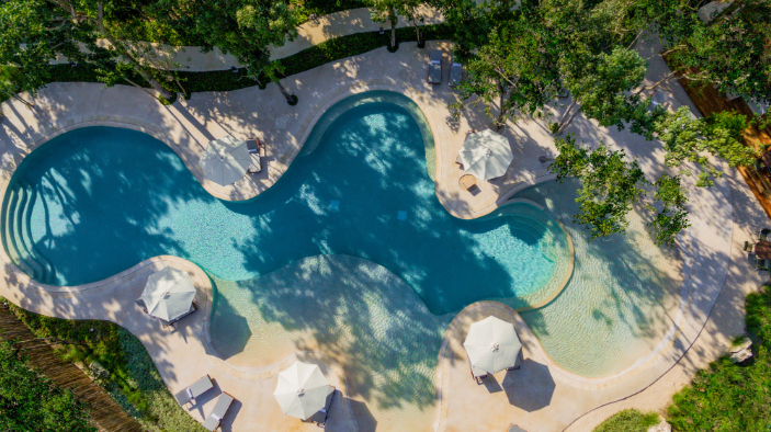 Condominium steps from the beach, ocean view pool, Playa del Carmen for sale.