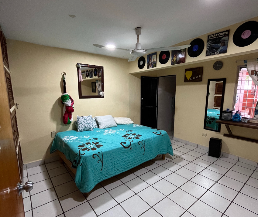 Corner house with garden and private terrace, 12 minutes from the beach, Avenue 11th, for sale. Cozumel.