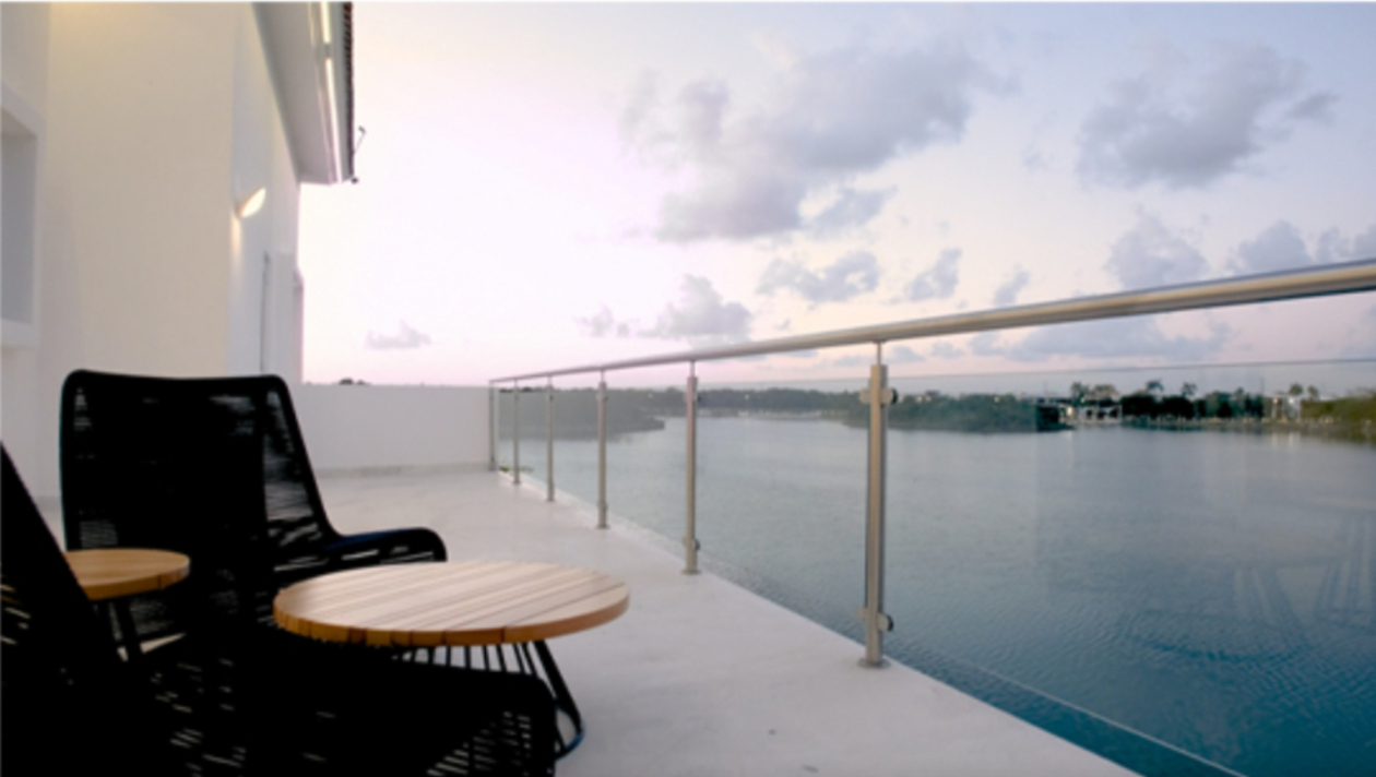 Casa con alberca privada y muelle, en venta, Pok Ta Pok, Zona Hotelera, Canc&uacute;n