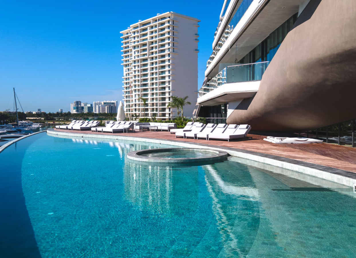 Condo with ocean and marina views, with amenities: infinity pool, spa, gym, lounge area, meeting room, lobby, located in Puerto Cancun