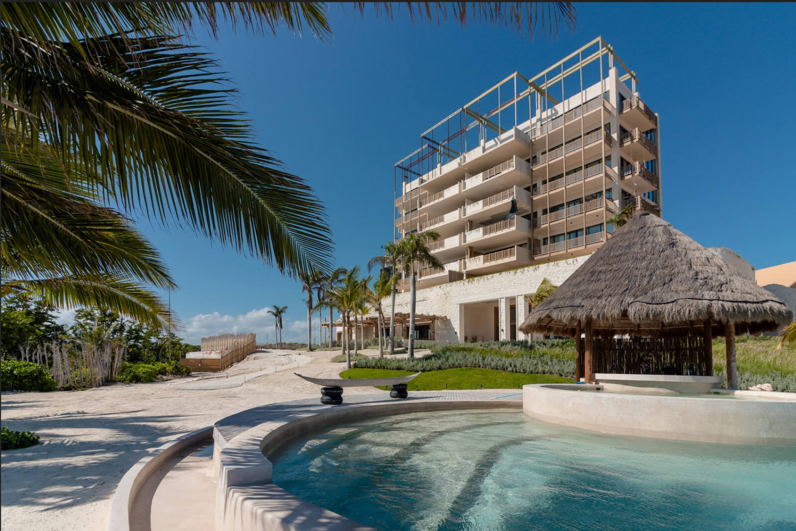 Two-story oceanfront penthouse with pool, pre-sale Playa del Carmen.