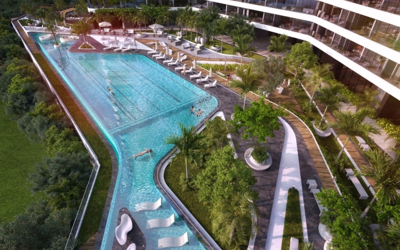 Luxury condo in sustainable building, overlooking the sea, golf course and the nature reserve. It has balconies, private elevator, terrace