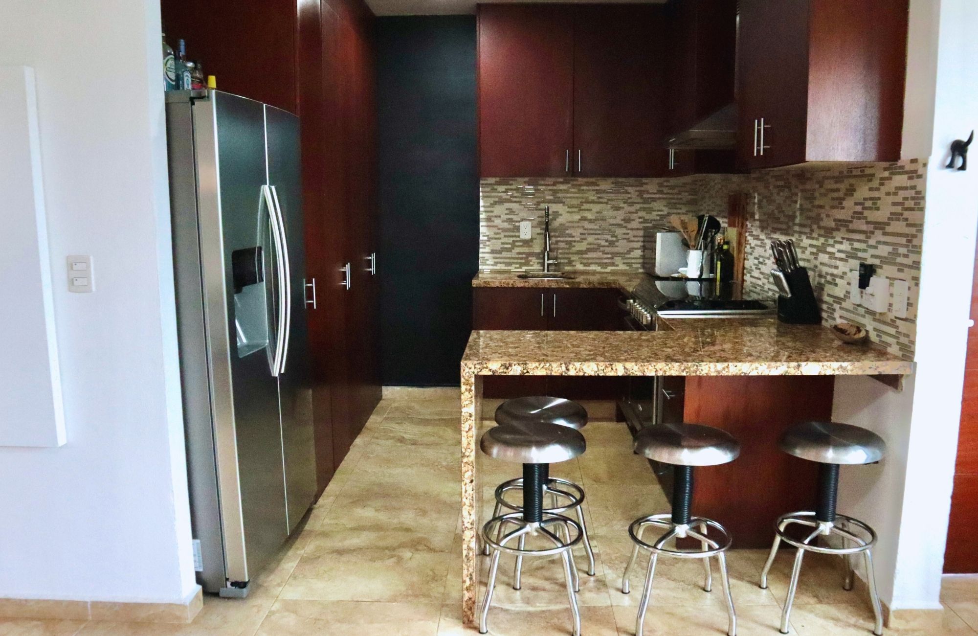 Penthouse 50 meters from the sea, smart home system, gym, kids club, pool, grill, for sale Costa Mujeres Cancun.