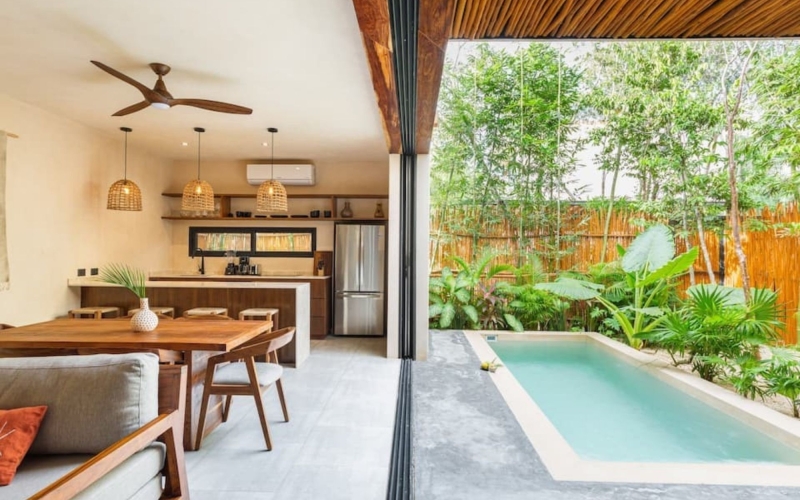 Luxury villa with pool, jacuzzi, and terrace for sale in Tulum.