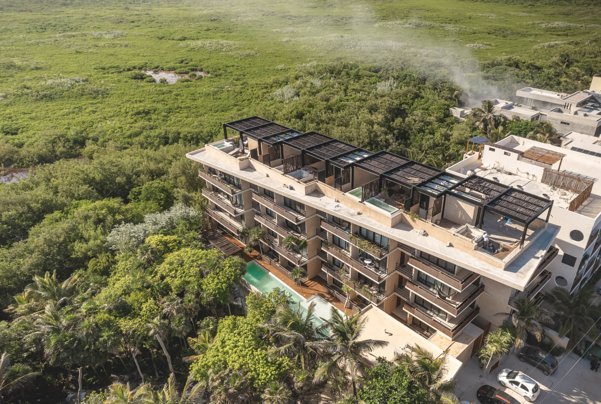 Departamento frente al mar con jacuzzi privado, alberca, pool bar, venta Tulum