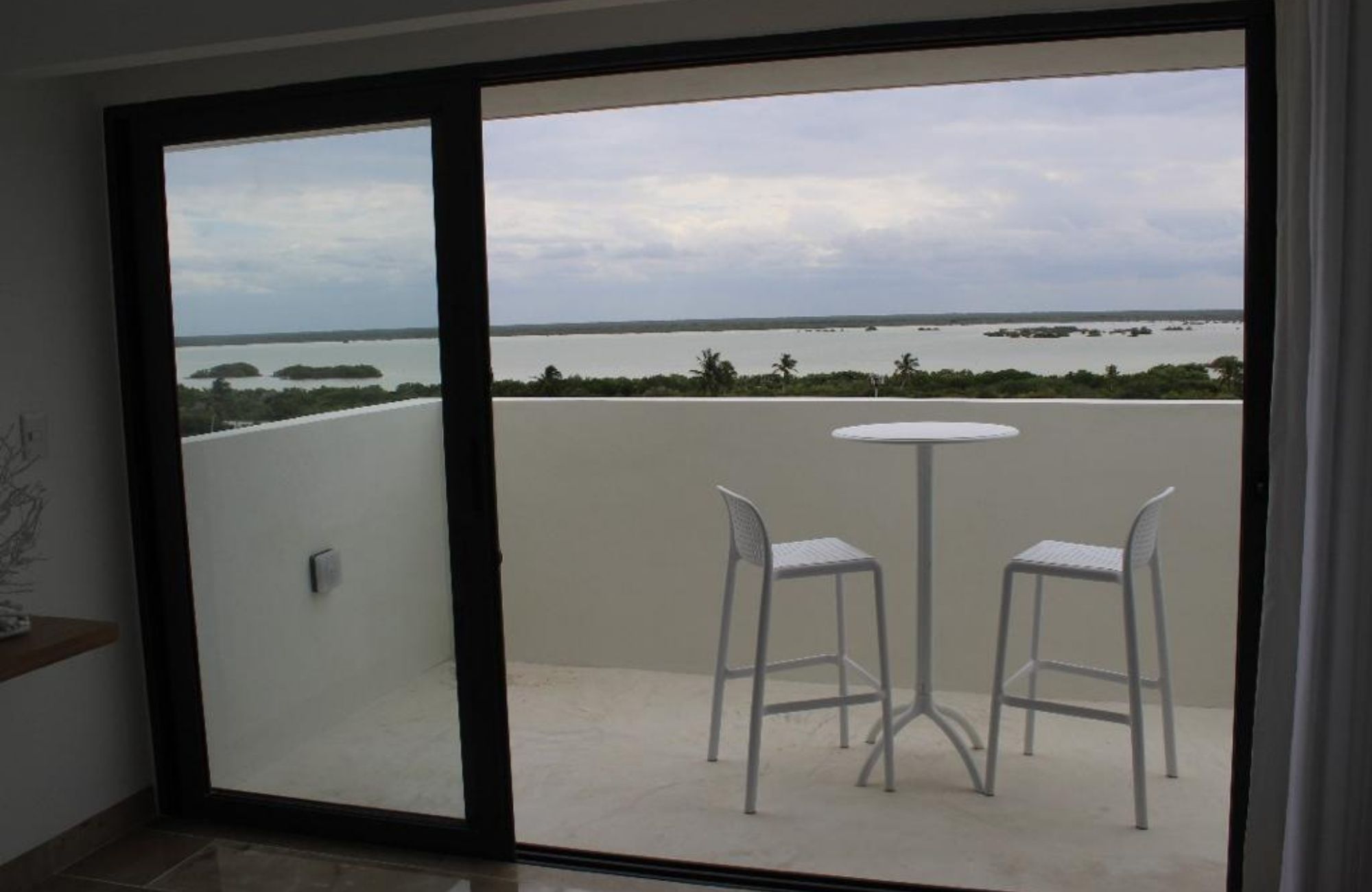 Condo con alberca frente al mar con terraza, en venta San crisanto Yucatan