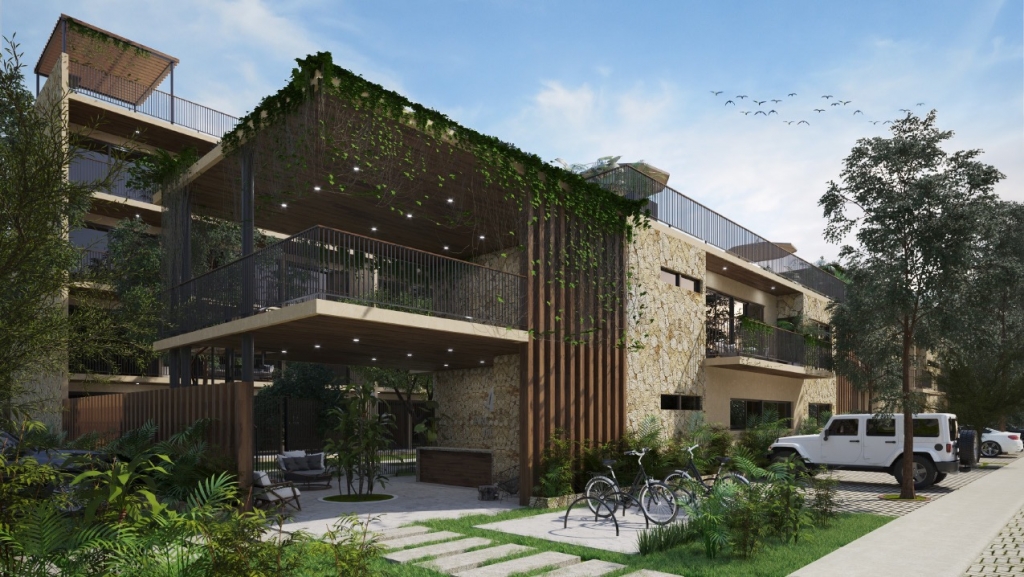 Condo for sale in Aldea Zama yoga area, terraces with lounge chairs,beach club access