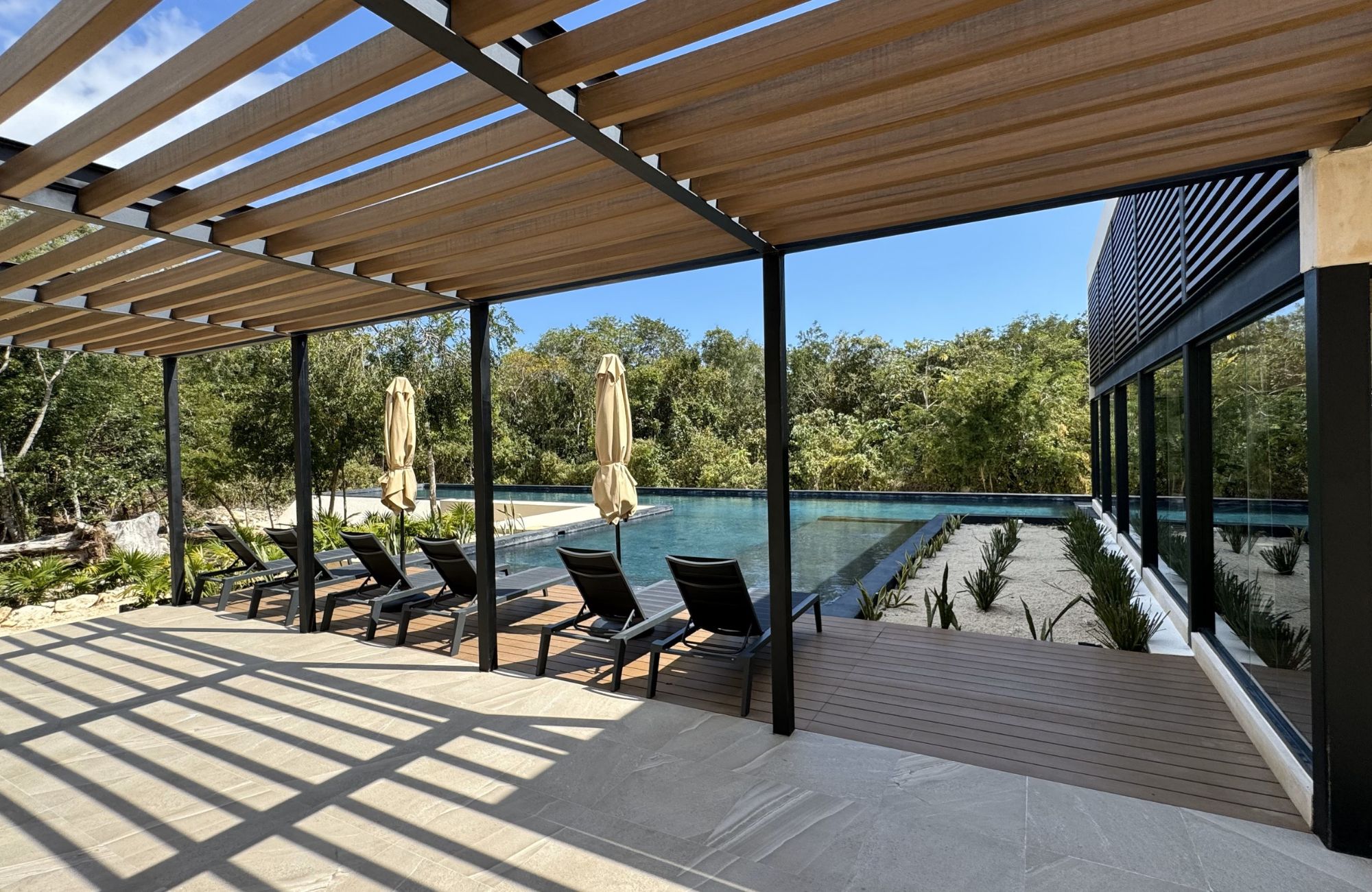 House with private pool, hot tub spa, smart key card, amenities: gym, juice and coffee bar, common pool, in Aldea Zama, Tulum for sale.