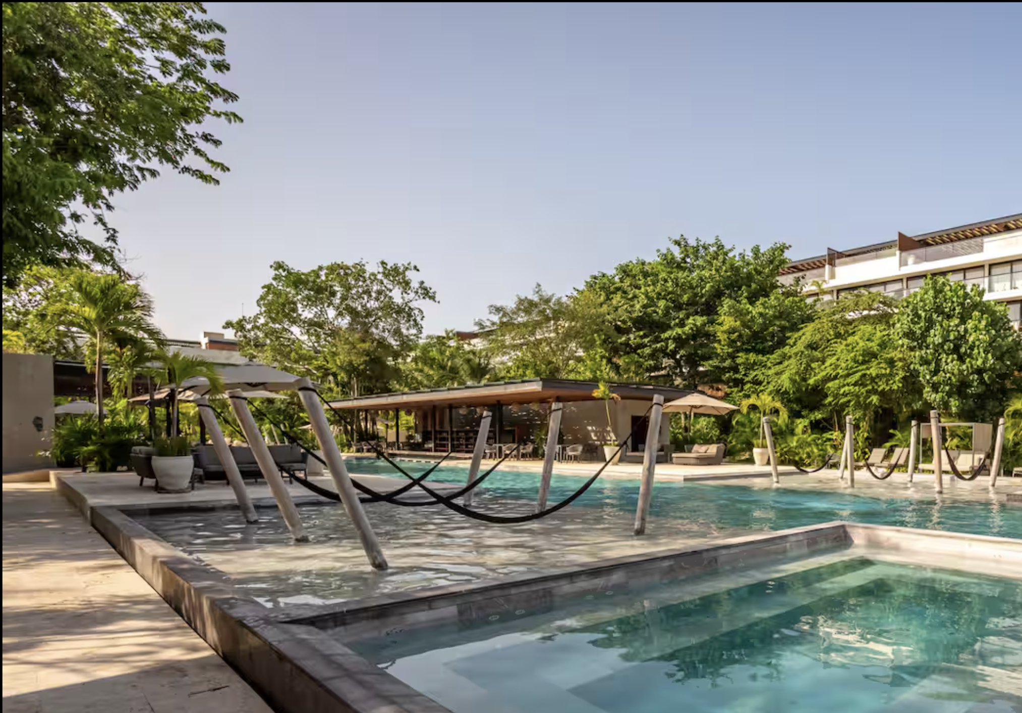 Condo steps from Fifth Avenue and the beach, rooftop, for sale Playa del Carmen.