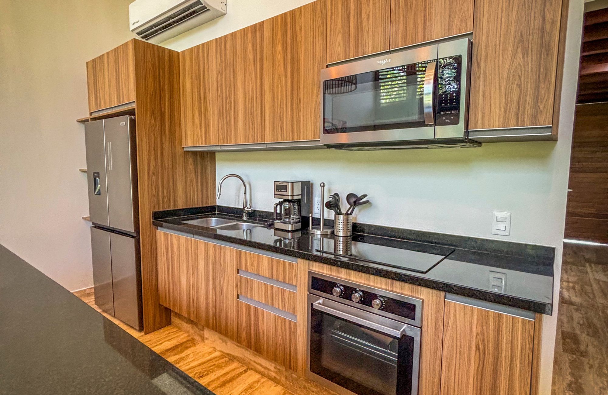 Condo steps from Fifth Avenue and the beach, rooftop, for sale Playa del Carmen.