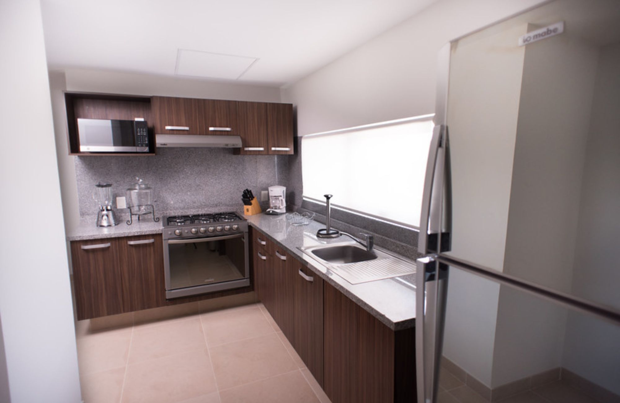 Penthouse 50 meters from the sea, smart home system, gym, kids club, pool, grill, for sale Costa Mujeres Cancun.