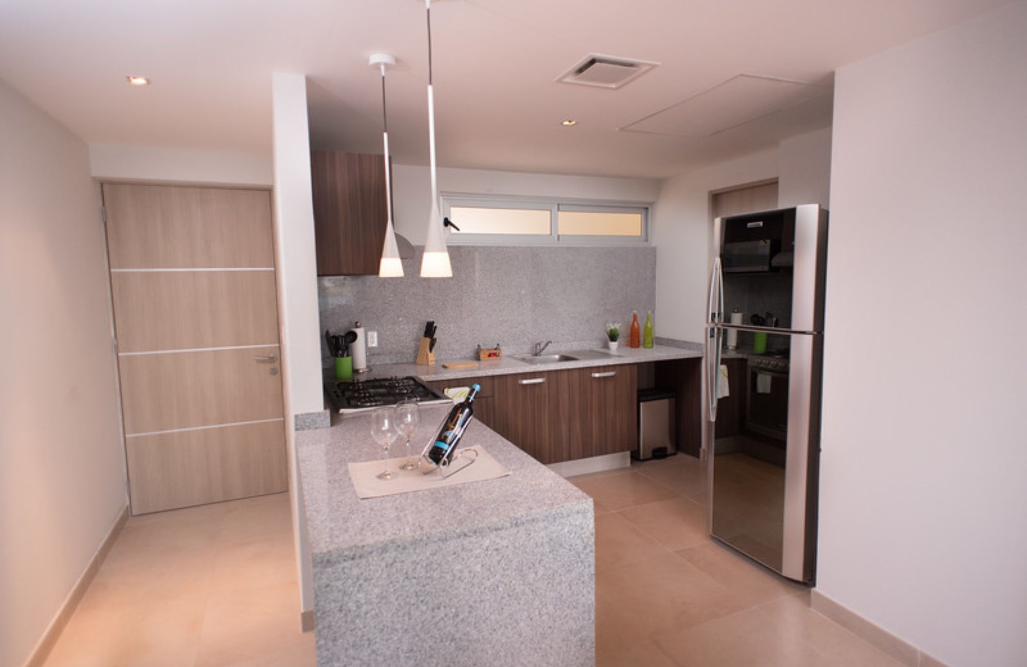 Penthouse 50 meters from the sea, smart home system, gym, kids club, pool, grill, for sale Costa Mujeres Cancun.