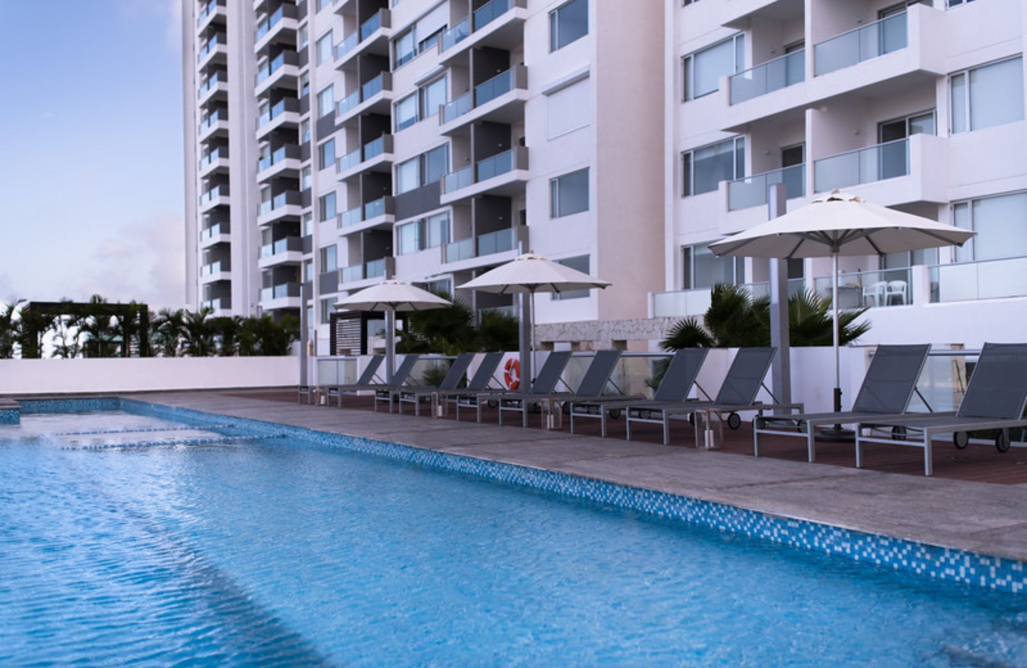 Penthouse 50 meters from the sea, smart home system, gym, kids club, pool, grill, for sale Costa Mujeres Cancun.