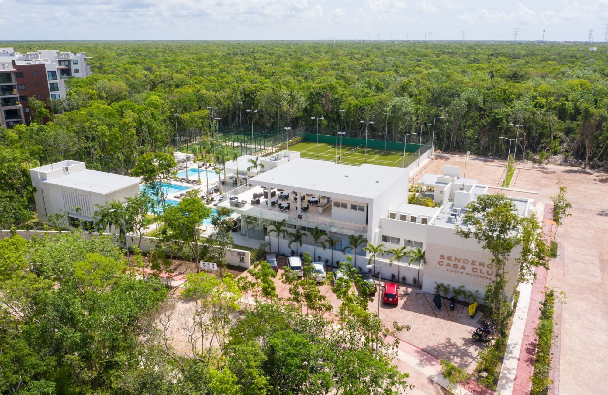Casa con doble altura y rooftop, alberca comun, El Encuentro, Playa del Carmen