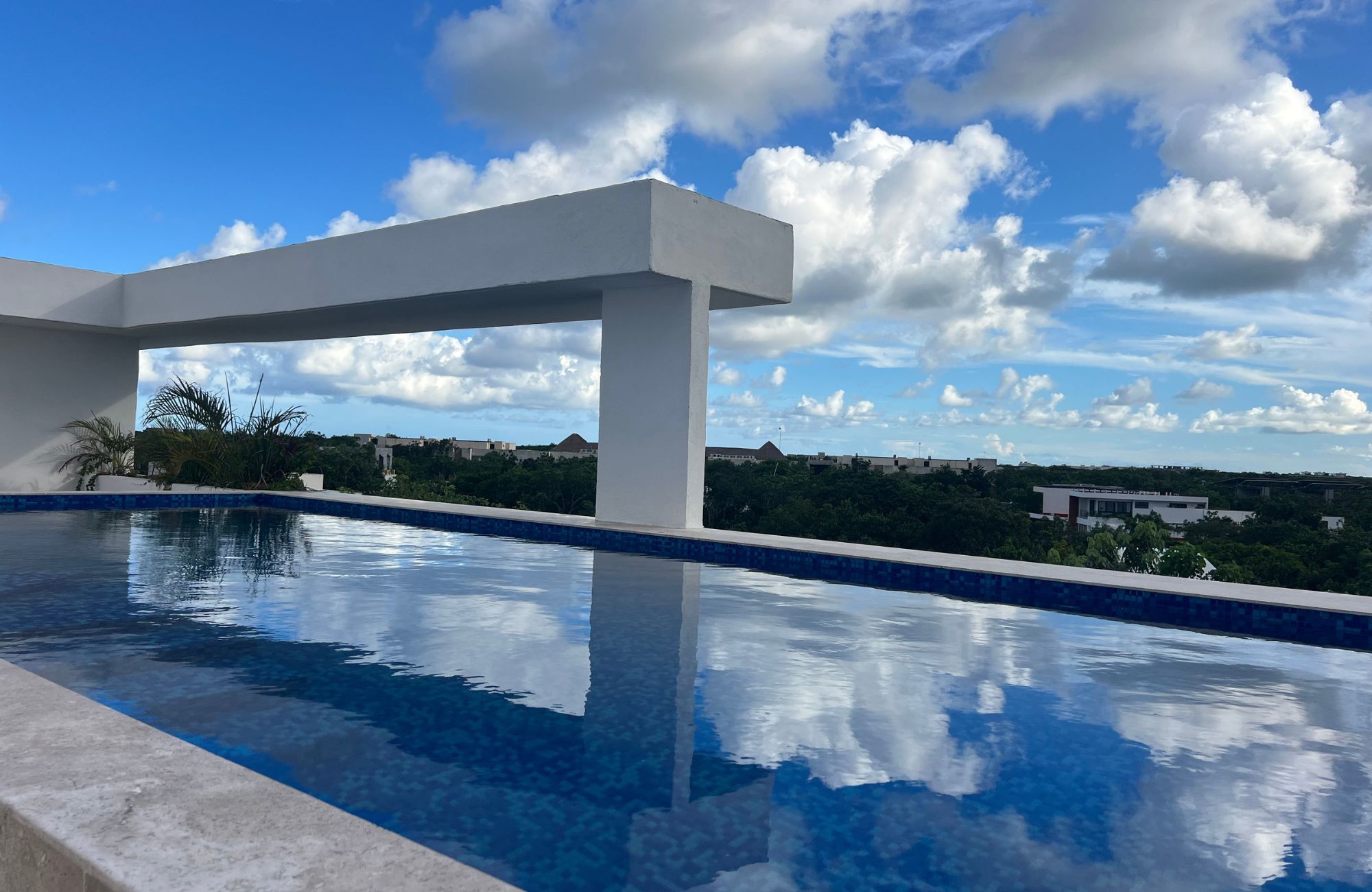 Green view condo, gym, business center, yoga and gym area, hammock garden, green areas in Aldea Zama Tulum, for sale.