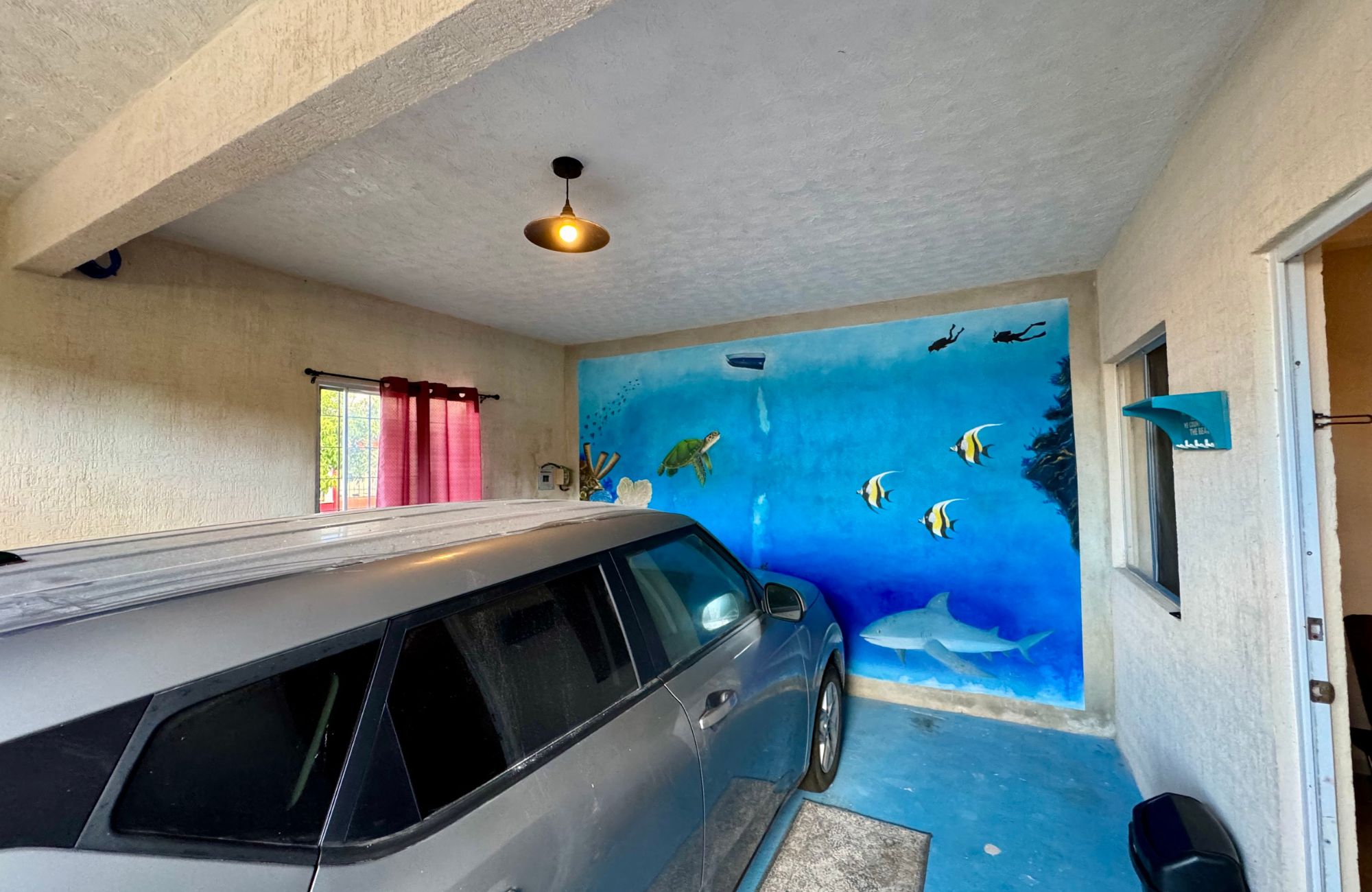 Corner house with balcony and palapa terrace for sale, El Encanto, Cozumel