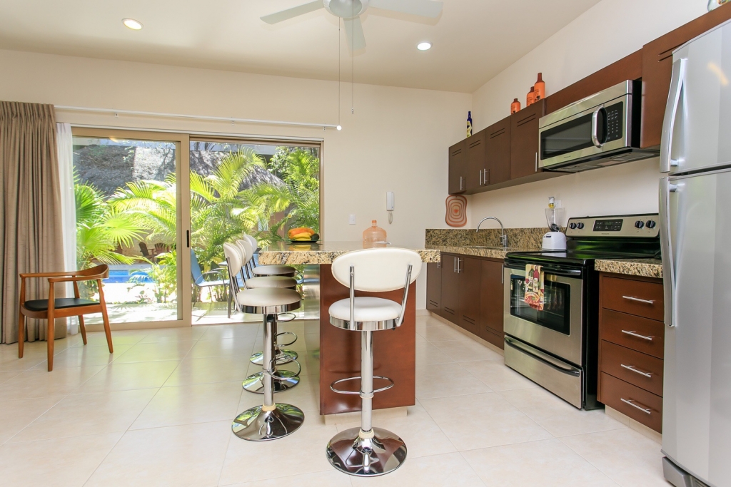 Ground floor condo with private pool, luxury finishes in Aldea Zama Tulum, for sale.
