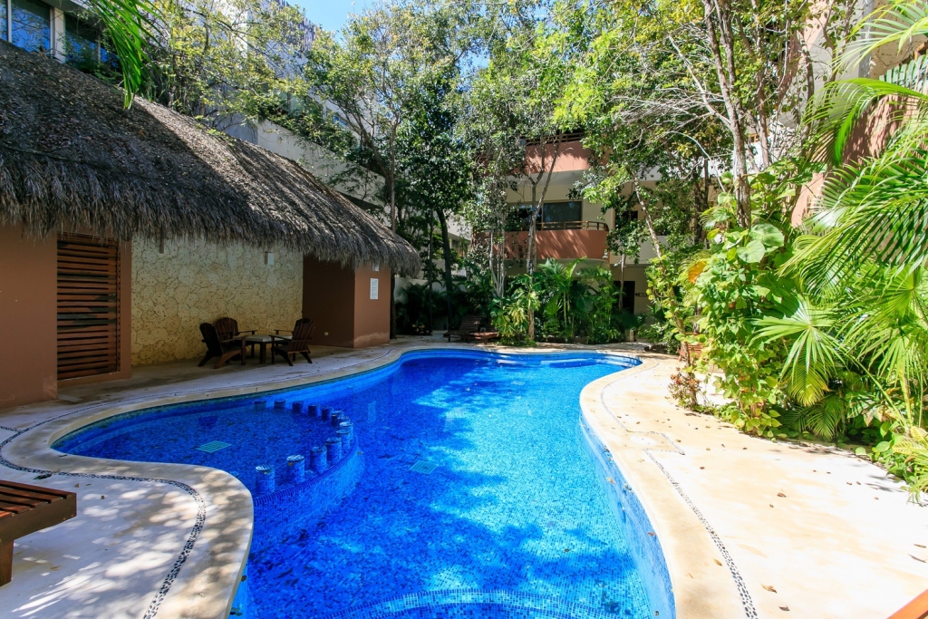 Ground floor condo with private pool, luxury finishes in Aldea Zama Tulum, for sale.