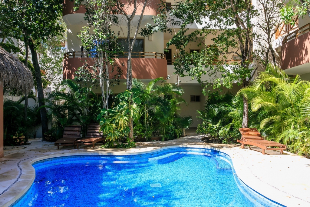 Ground floor condo with private pool, luxury finishes in Aldea Zama Tulum, for sale.
